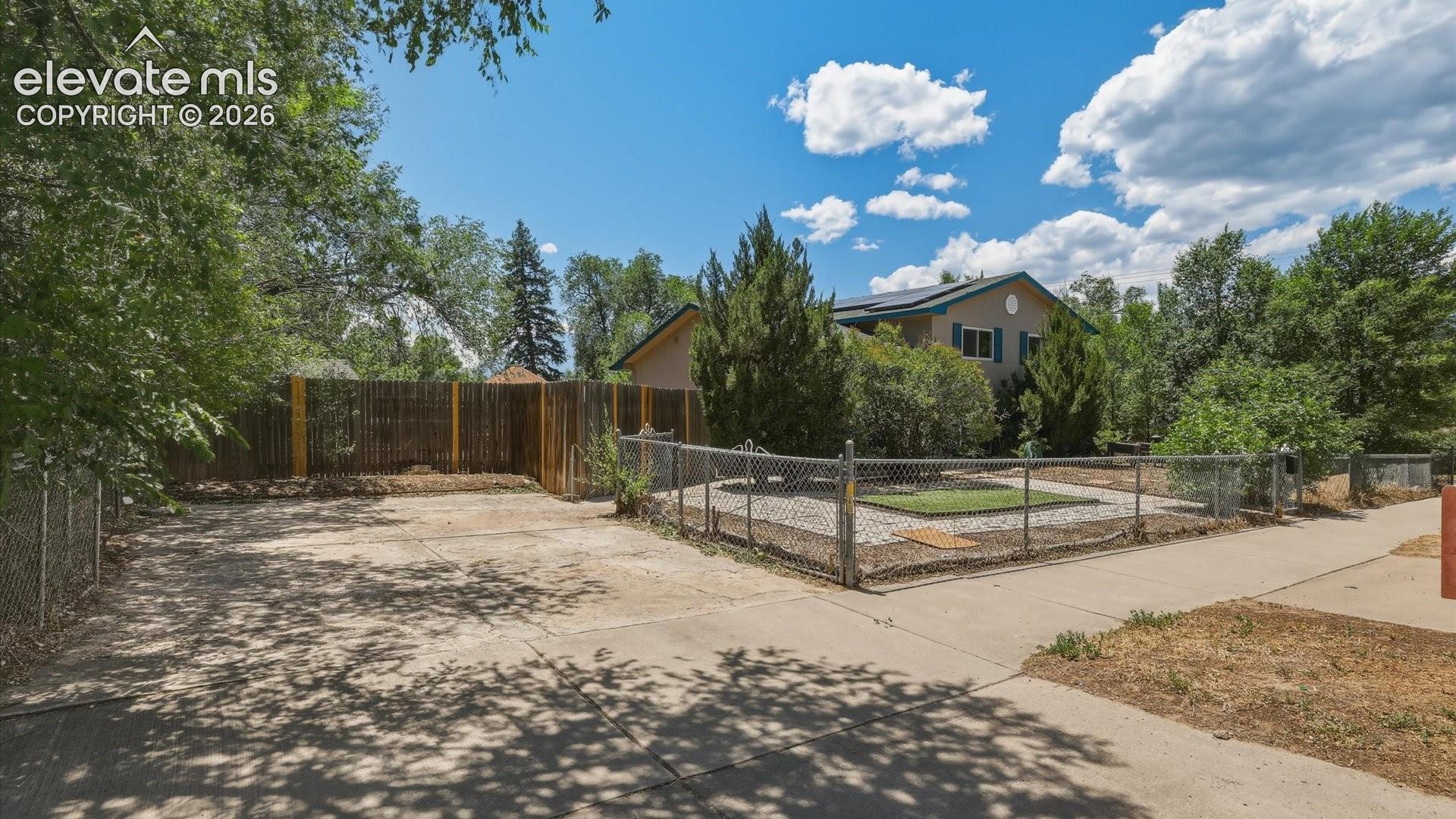 Concrete driveway for off street parking or RV storage.