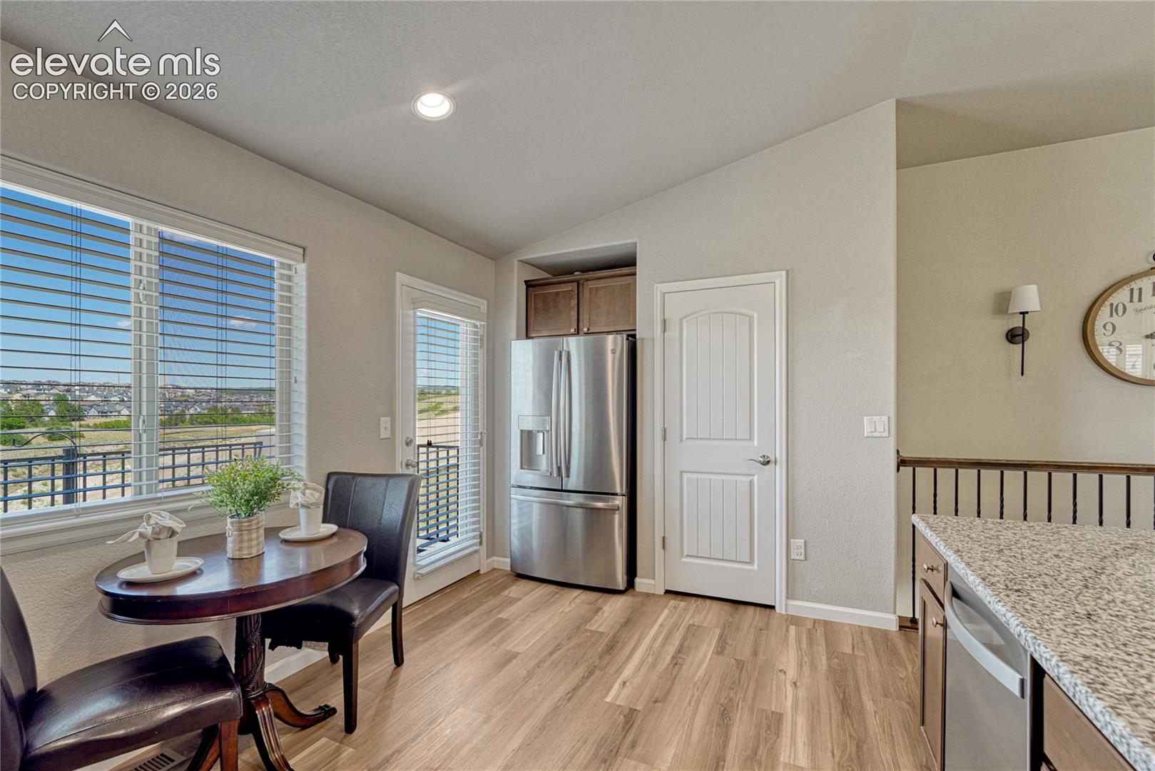 Start your morning in the bright breakfast nook with convenient access to the deck and beautiful views beyond.
