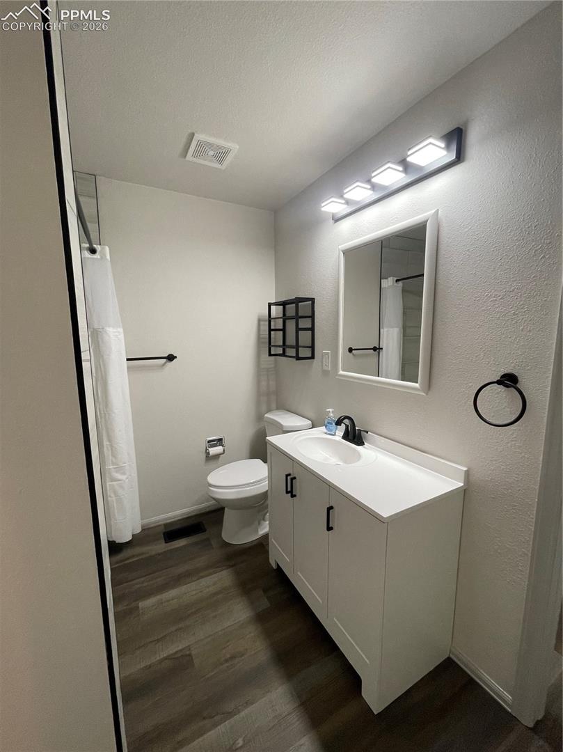 4 Piece Bath / Main Level  (Laundry Shoot In Cabinet)