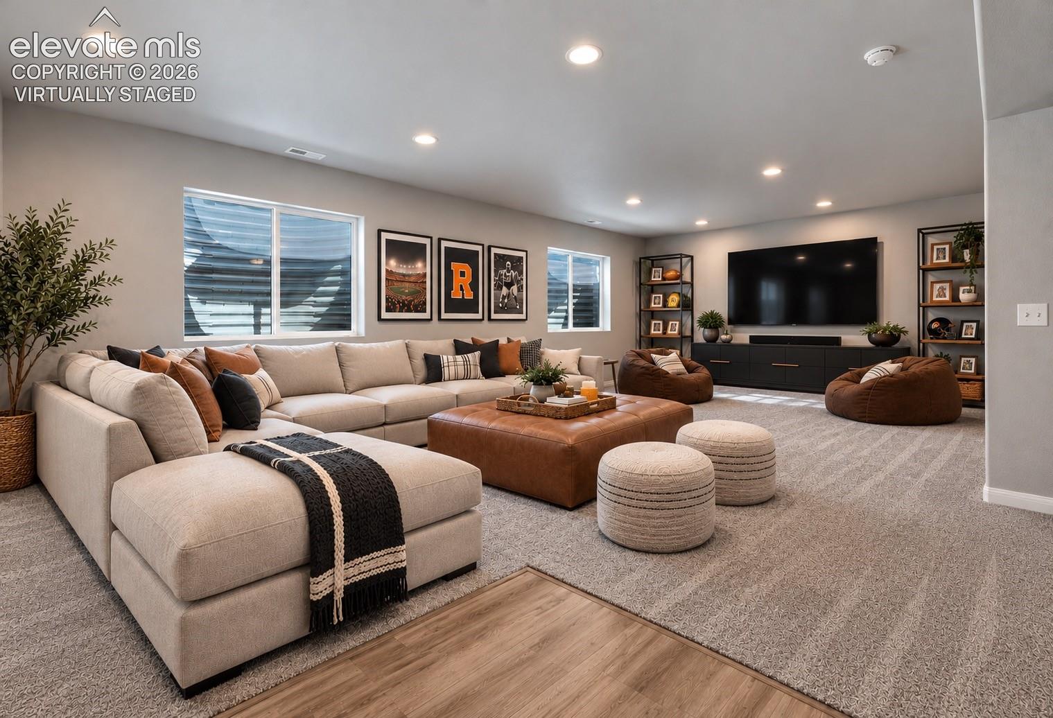 Virtually Staged Open-concept room featuring neutral wall paint, recessed lighting, wall-to-wall carpeting, and wood-finish flooring