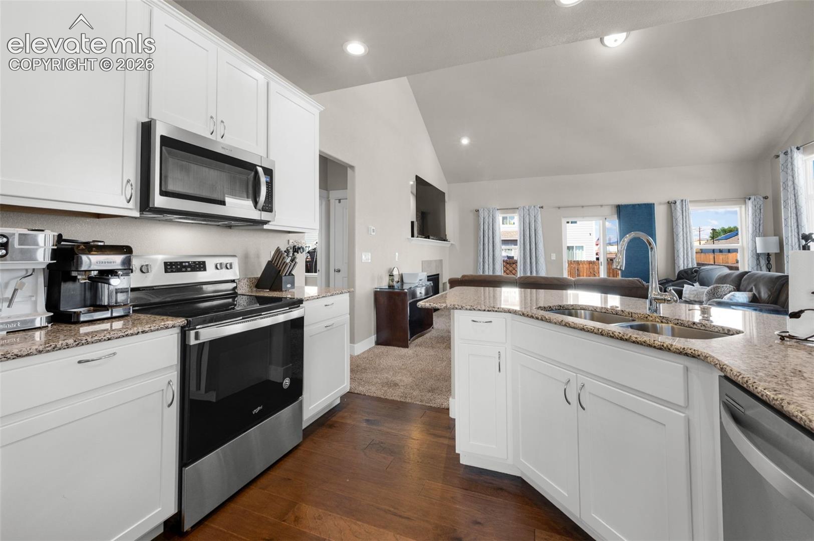 Granite countertops and stainless appliances are included