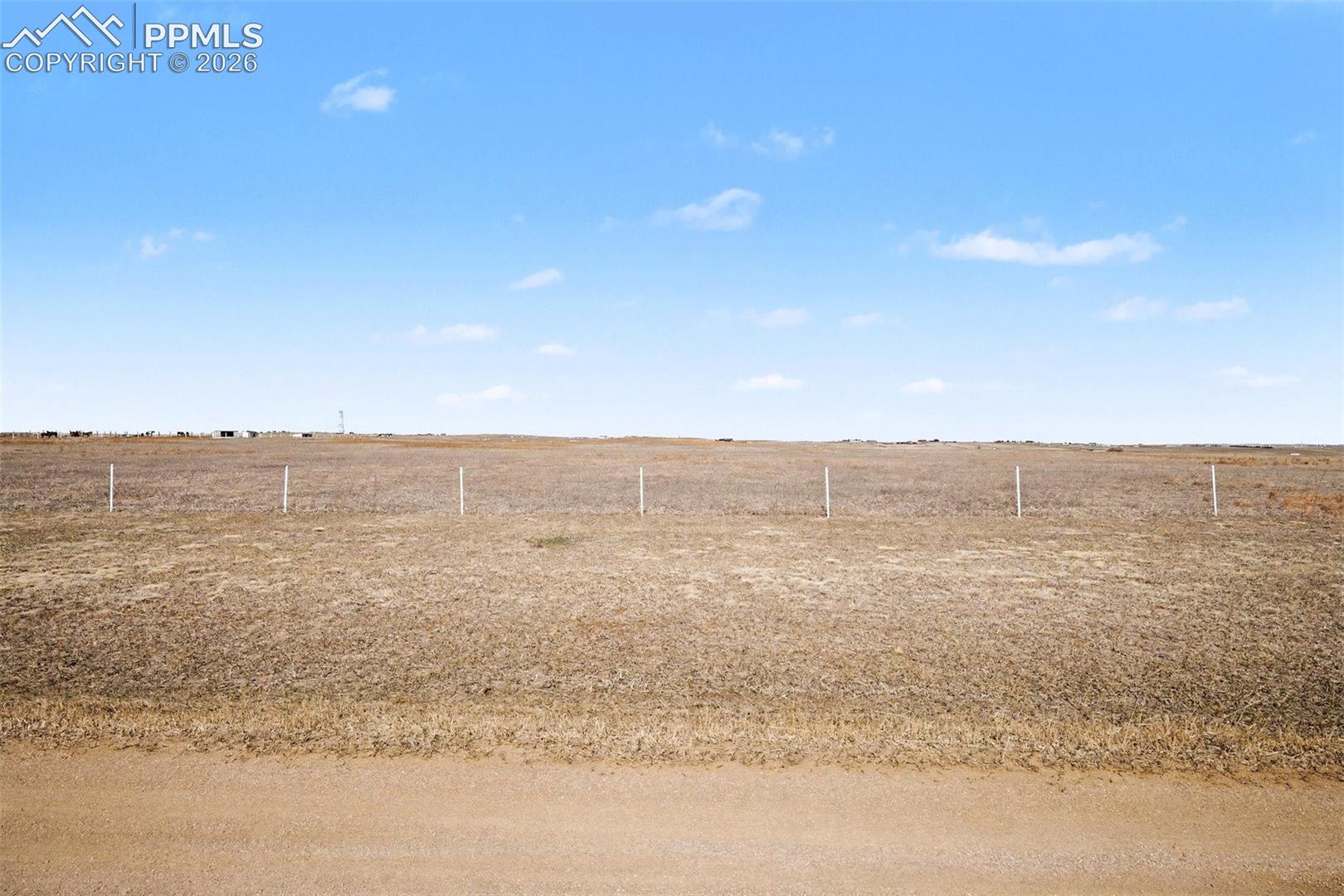 Additional view of the property showing natural landscape features.
