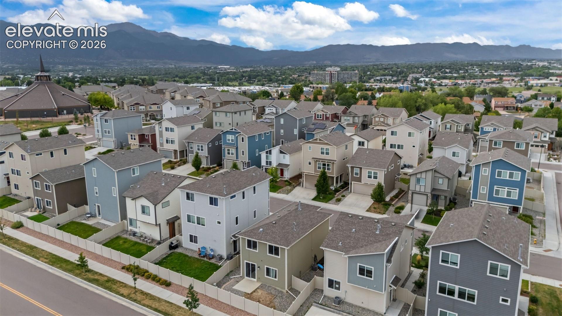 Residential development featuring multi-story homes with varied exterior finishes