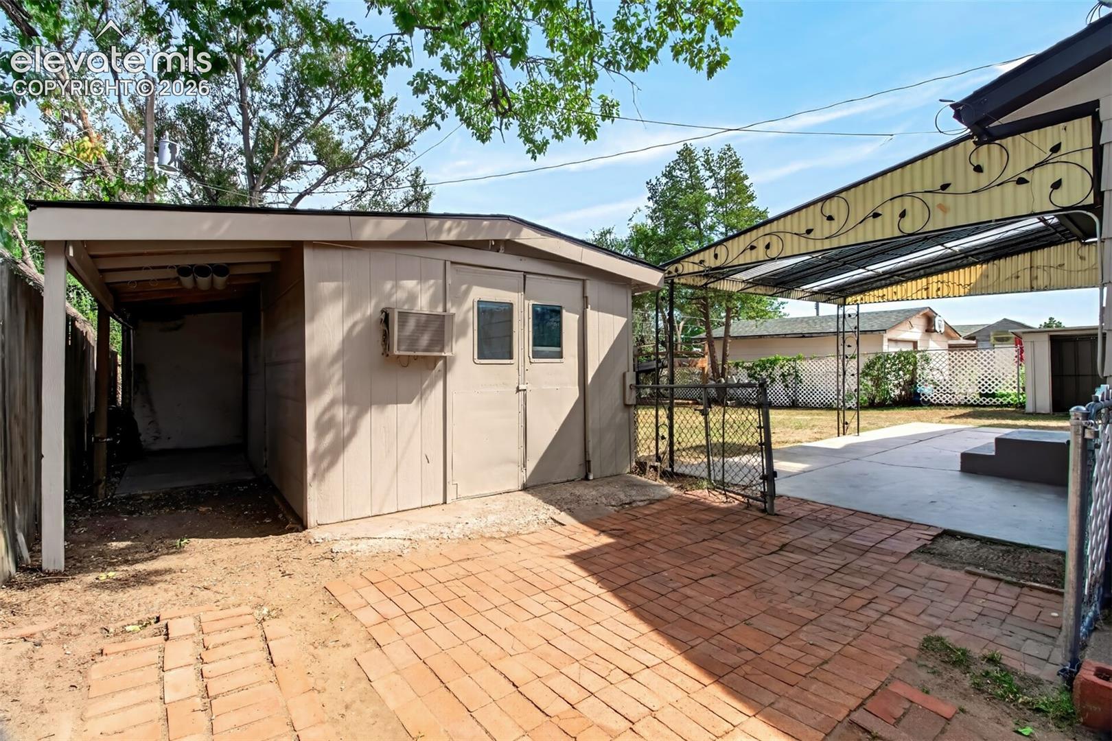 Larger 18x10 Shed with side motorcycle parking