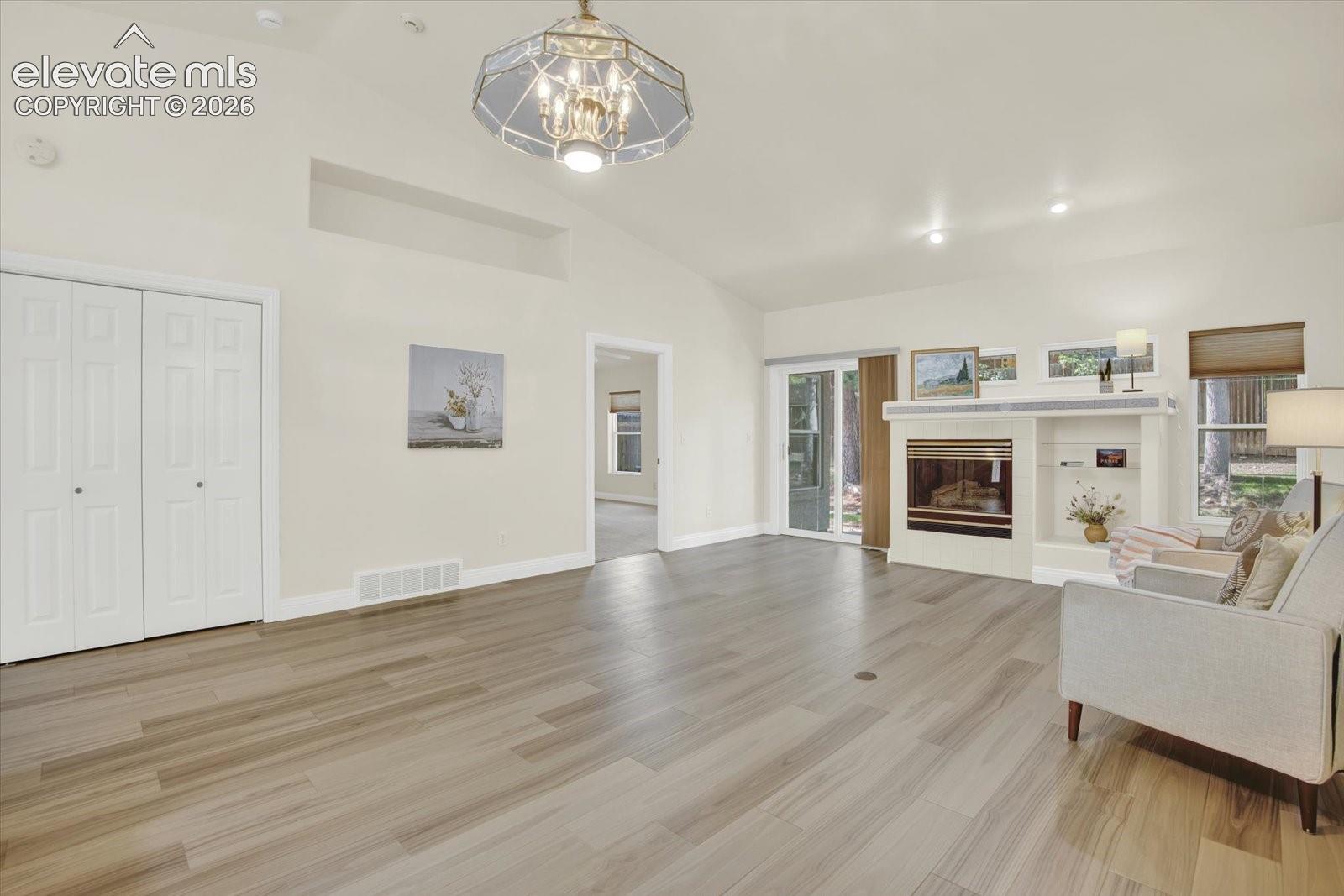 Vaulted ceilings, new LVP flooring.