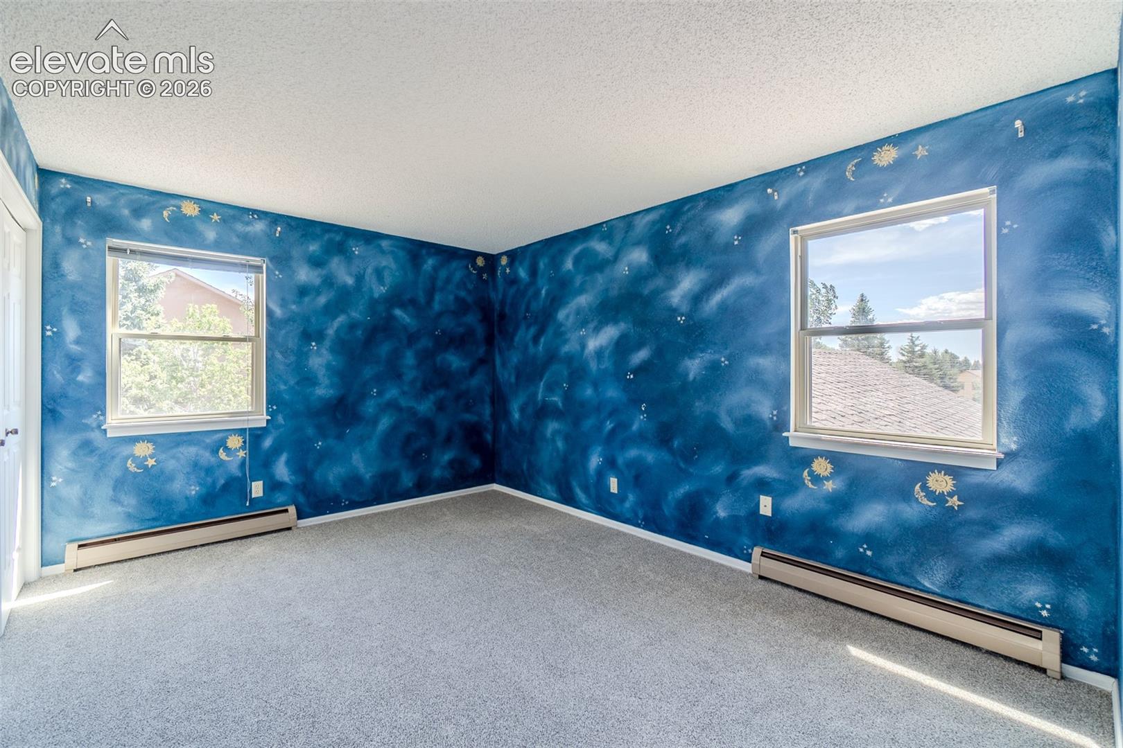 Two of Four upstairs bedroom with new carpet 