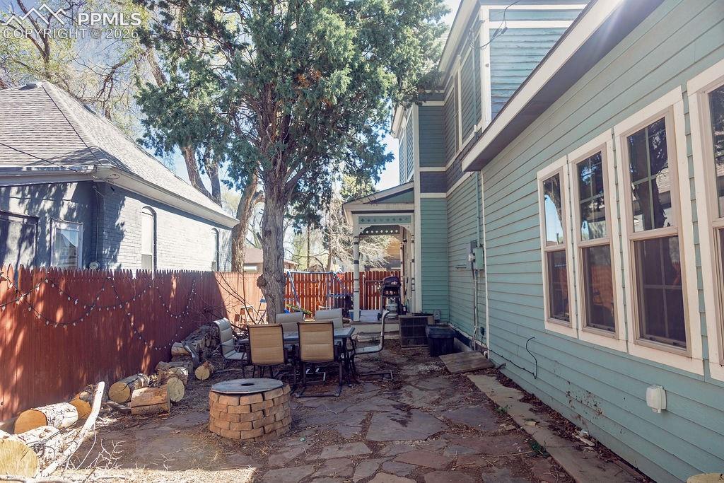 North Side of Backyard (Looking Toward Front Yard & Walk-Out from Dining Room)