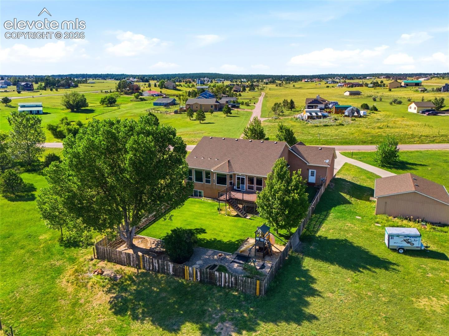 Backyard is fenced & acreage is perimeter fenced