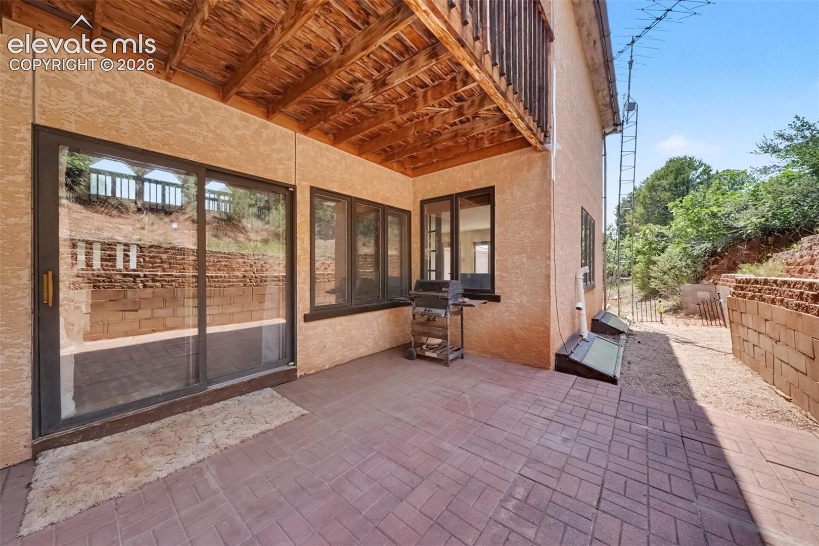 Spacious patio with convenient walkout access from the living and dining areas, creating a seamless connection between indoor and outdoor living