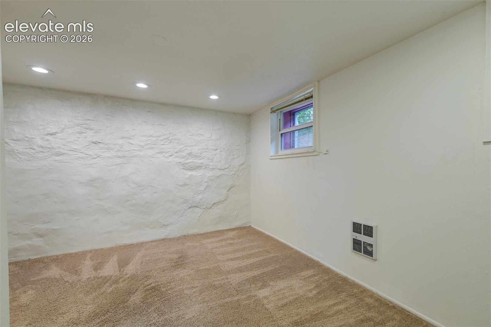 Basement unit located in the back of the property 