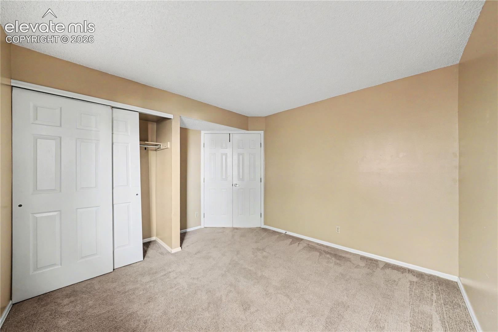 Bedroom with double door closet