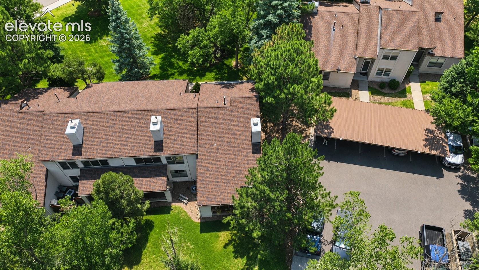 Aerial view of complex and carports.