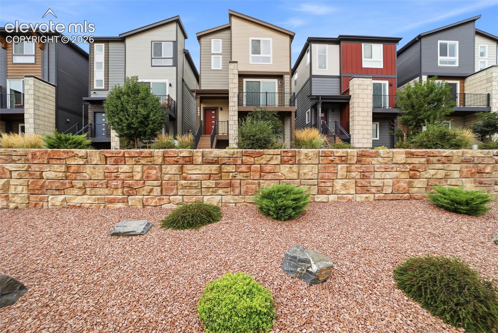 Modern multi-level homes with varied exterior finishes
