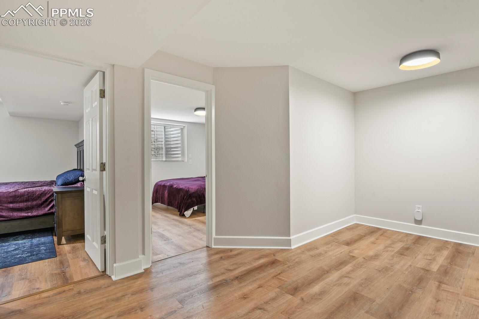 Basement living area featuring LVP flooring