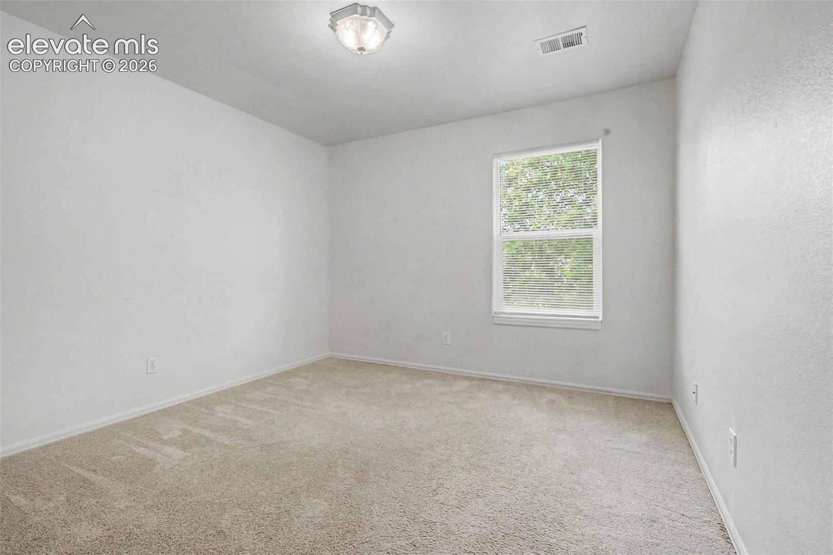 Bright Secondary Bedroom