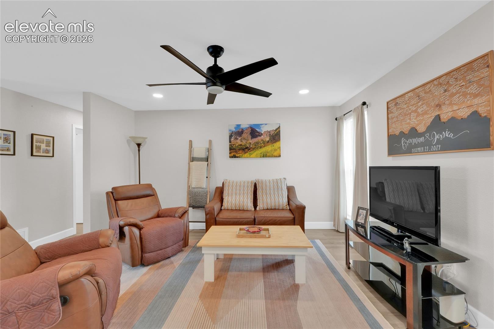 Living room with recessed lighting.