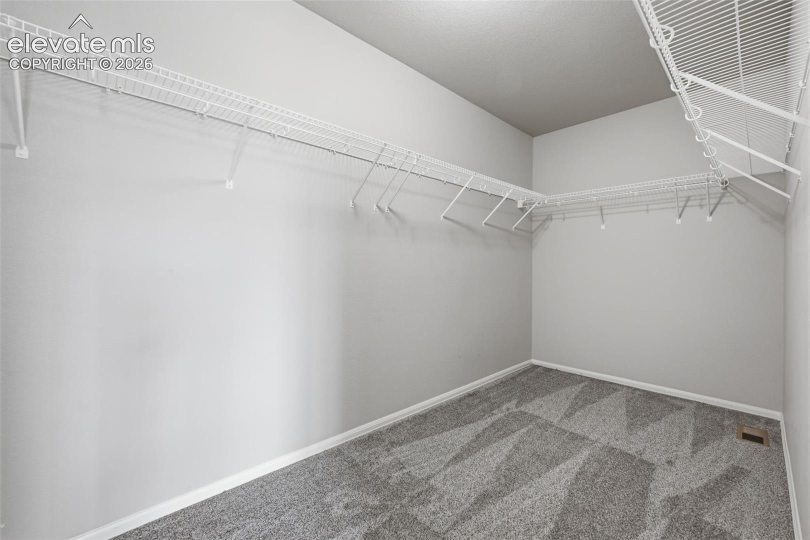 Spacious Primary Bedroom Walk-in Closet
