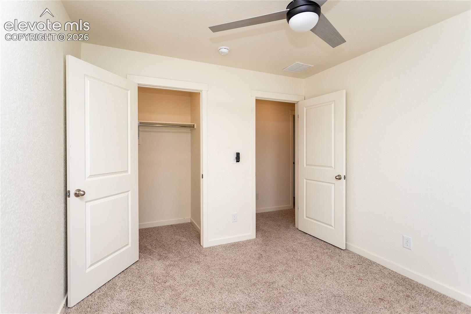 Bedroom 4 with a walk-in closet