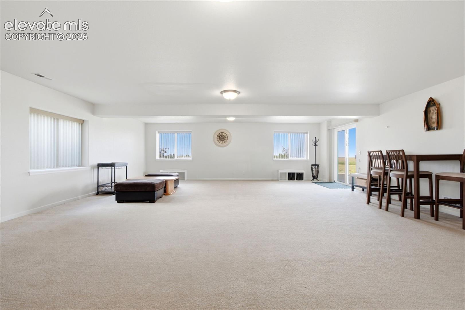 Basement family room with walkout access to the patio