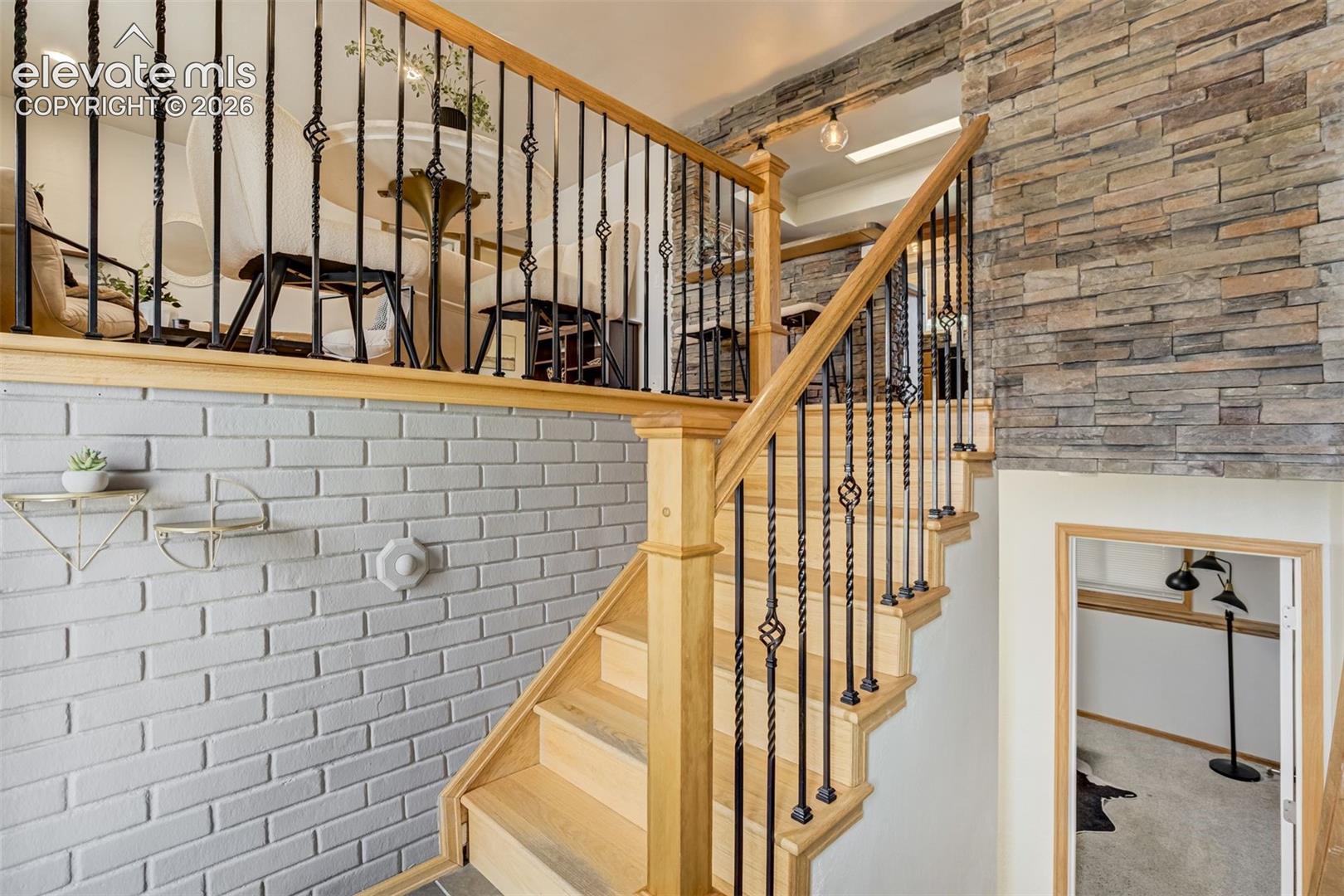 We love a good stone accent wall at an entry. 