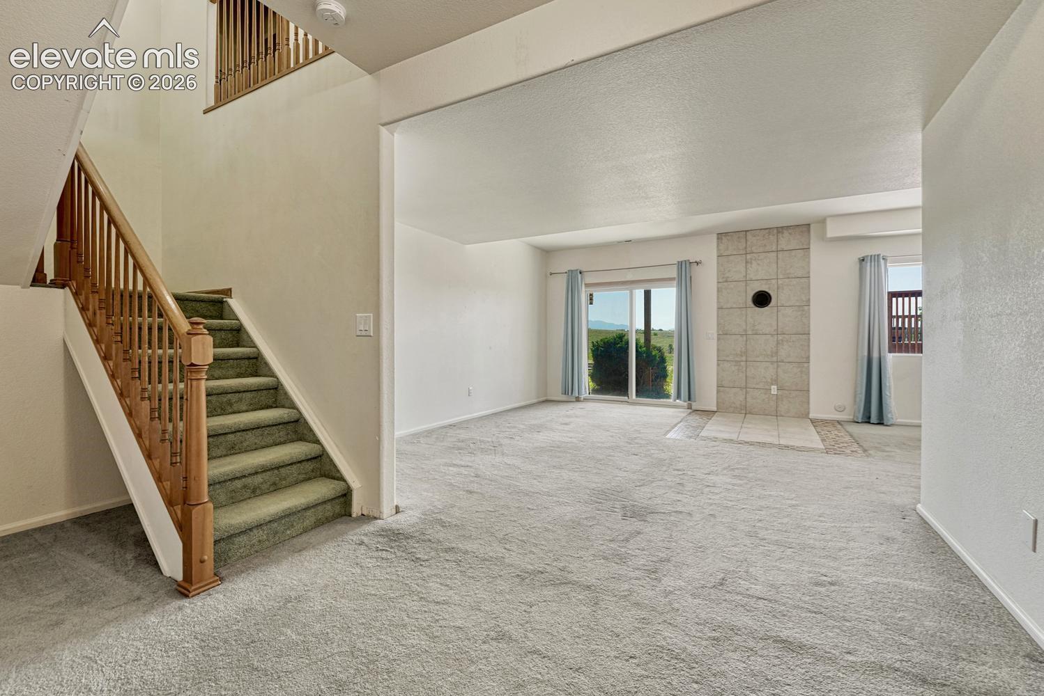 Stairs to walkout basement and living area