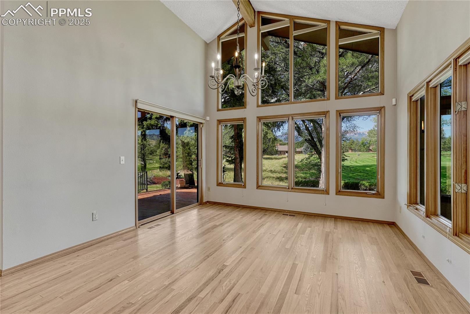 Vaulted with Huge windows to the Golf Course & Views