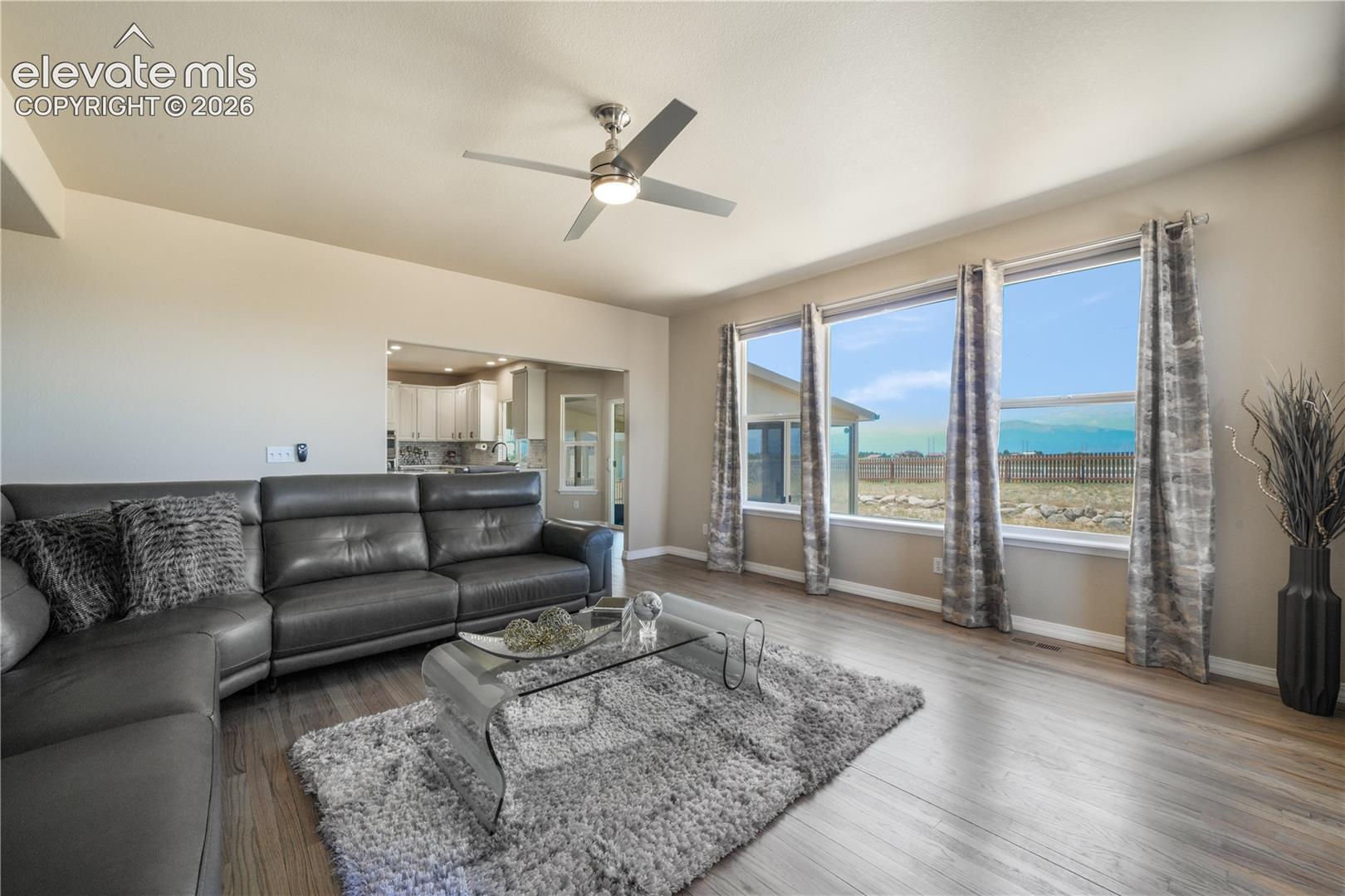 Spacious Family Room with Gas Fireplace and Natural Light