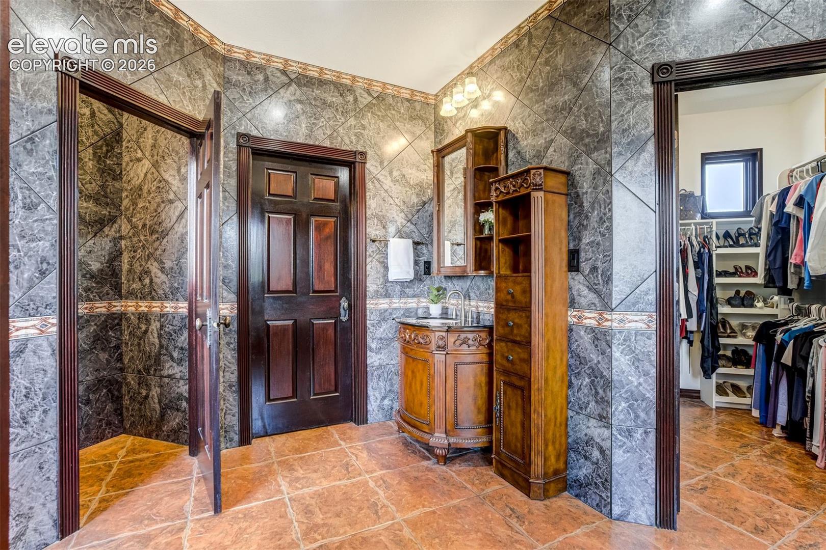 Dual closets, private water closet, and space to relax. 