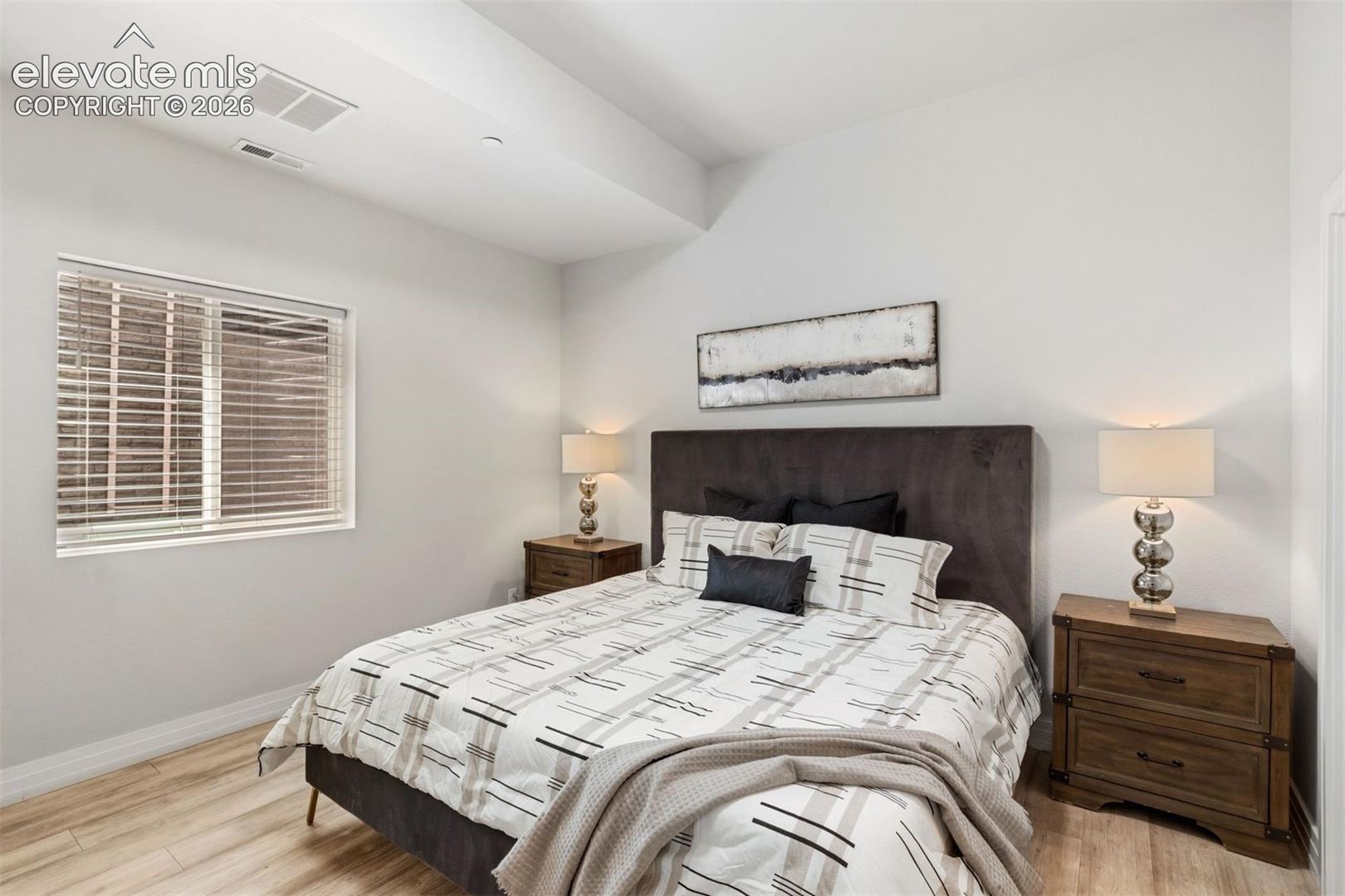 Basement bedroom with ensuite full bath and walk-in closet