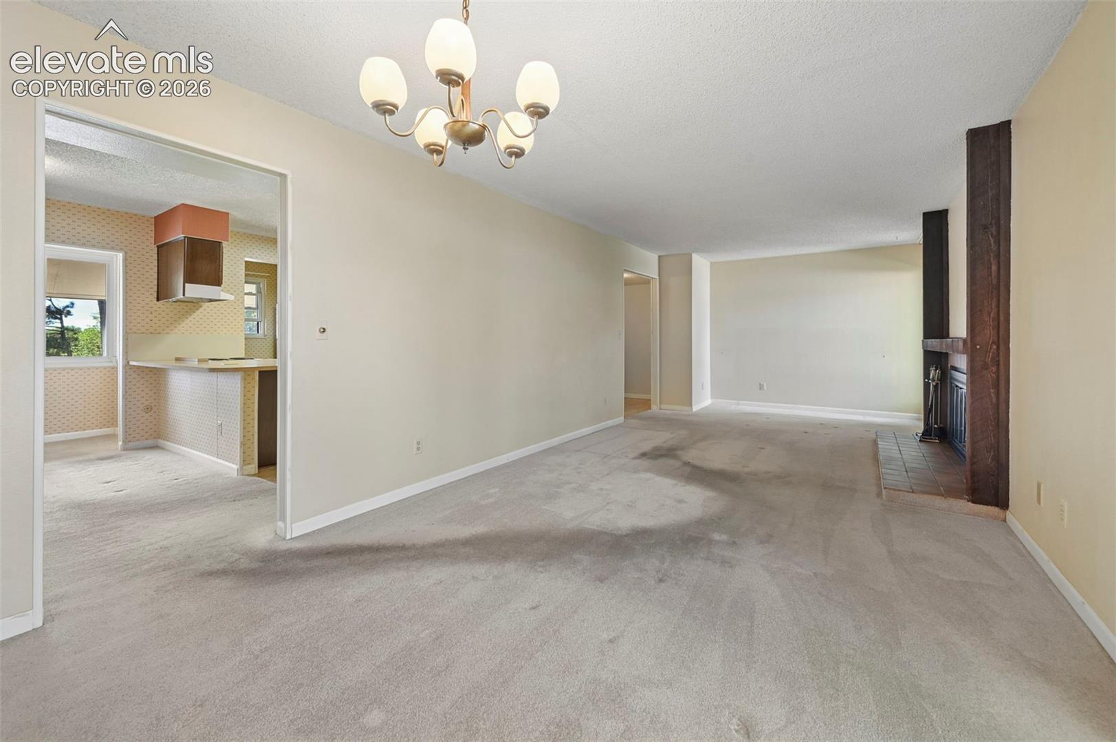 Dining area off kitchen opens to Living Room