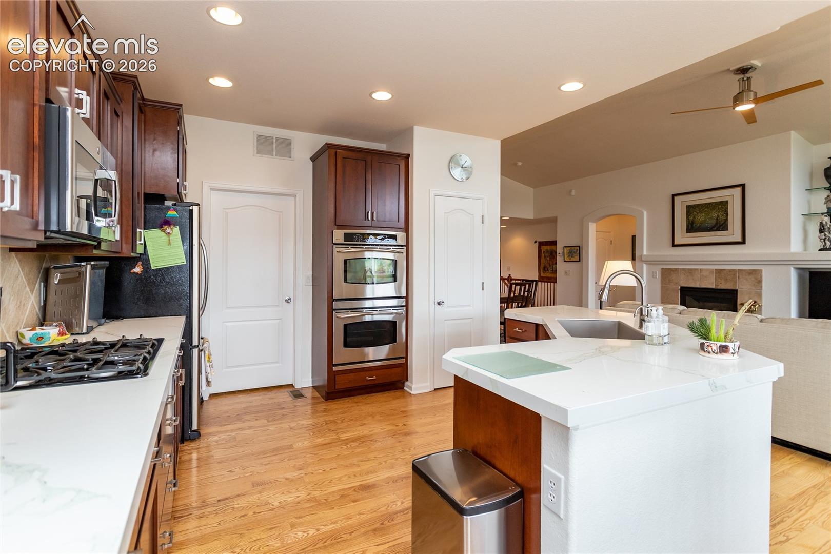 A roomy pantry, plenty of cabinets, lots of storage & prep areas.