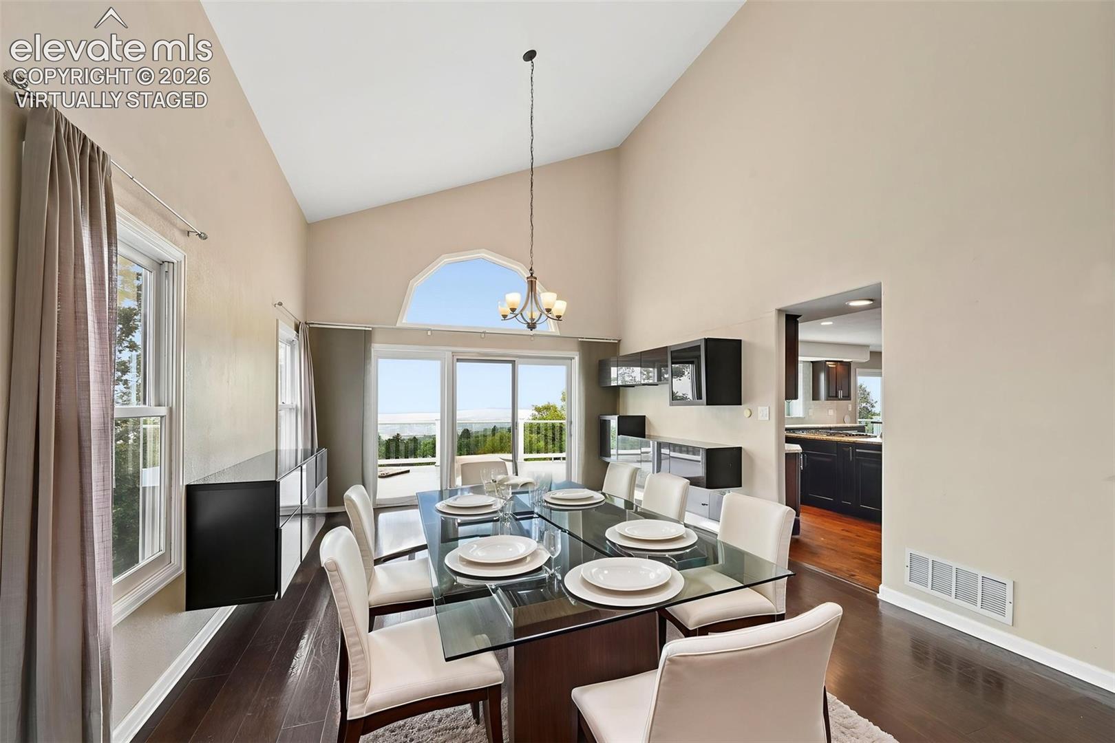 virtually staged  Dining room with walkout to large upper deck