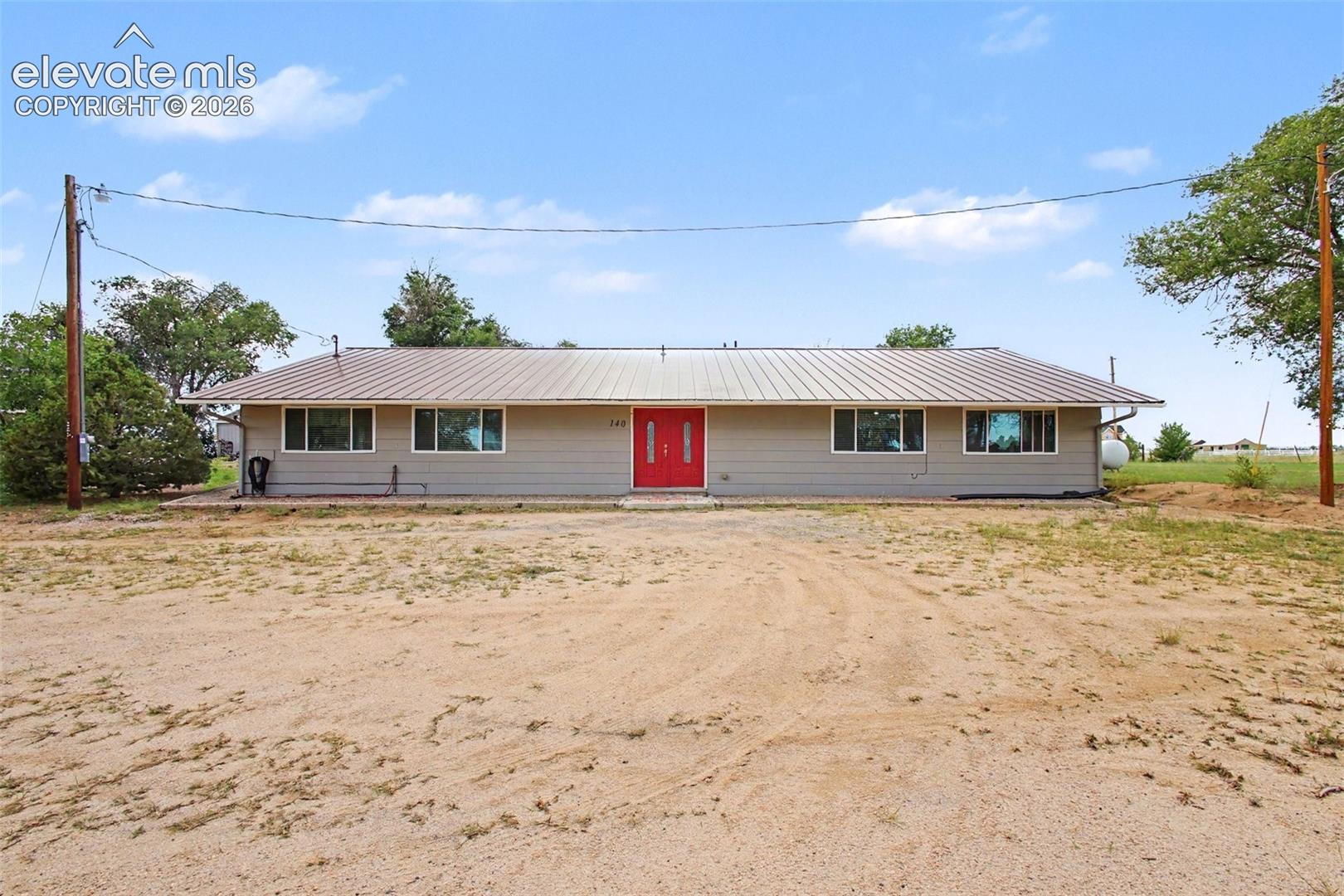The spacious property and expansive grounds provide plenty of room for vehicles, RVs, guests, and outdoor activities.