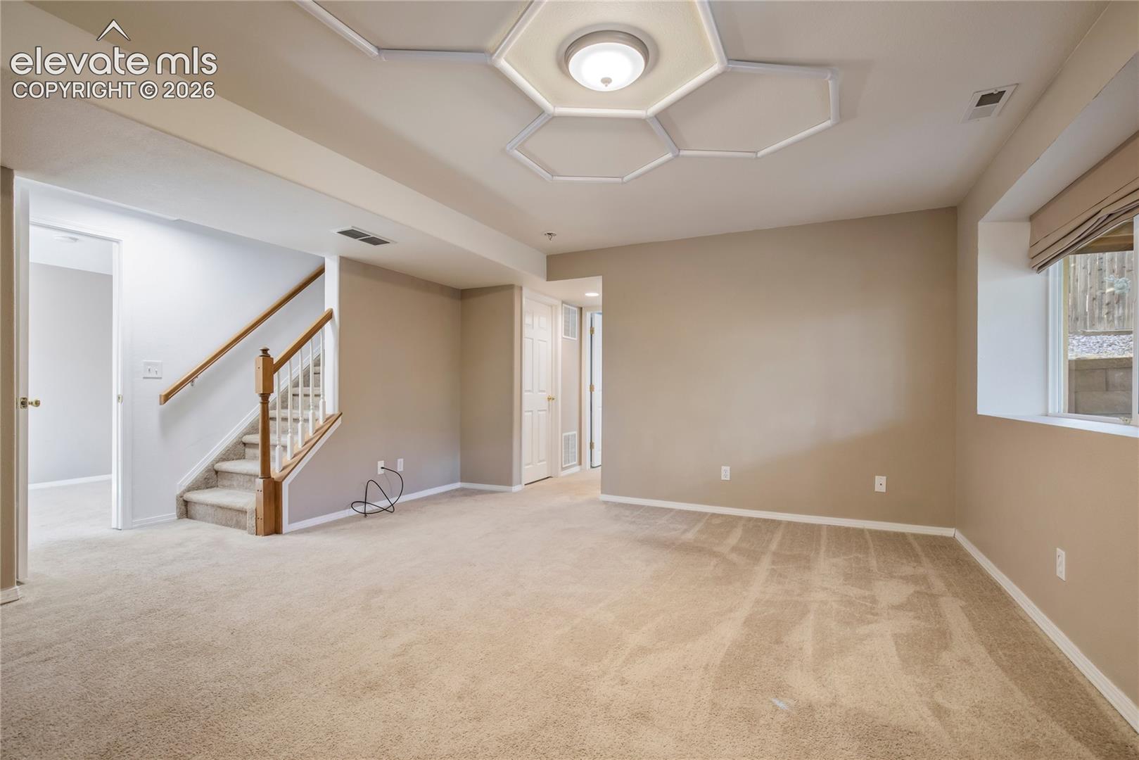 The finished walk-out basement adds an additional family/rec room, 2 bedrooms + a three-quarter bath, offering flexibility for guests, hobbies or multi-generational living.