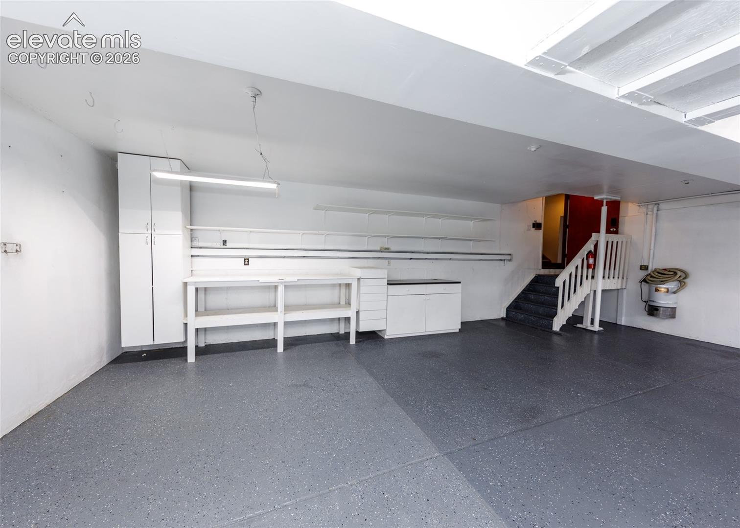Graage with cabinets and installed heating system