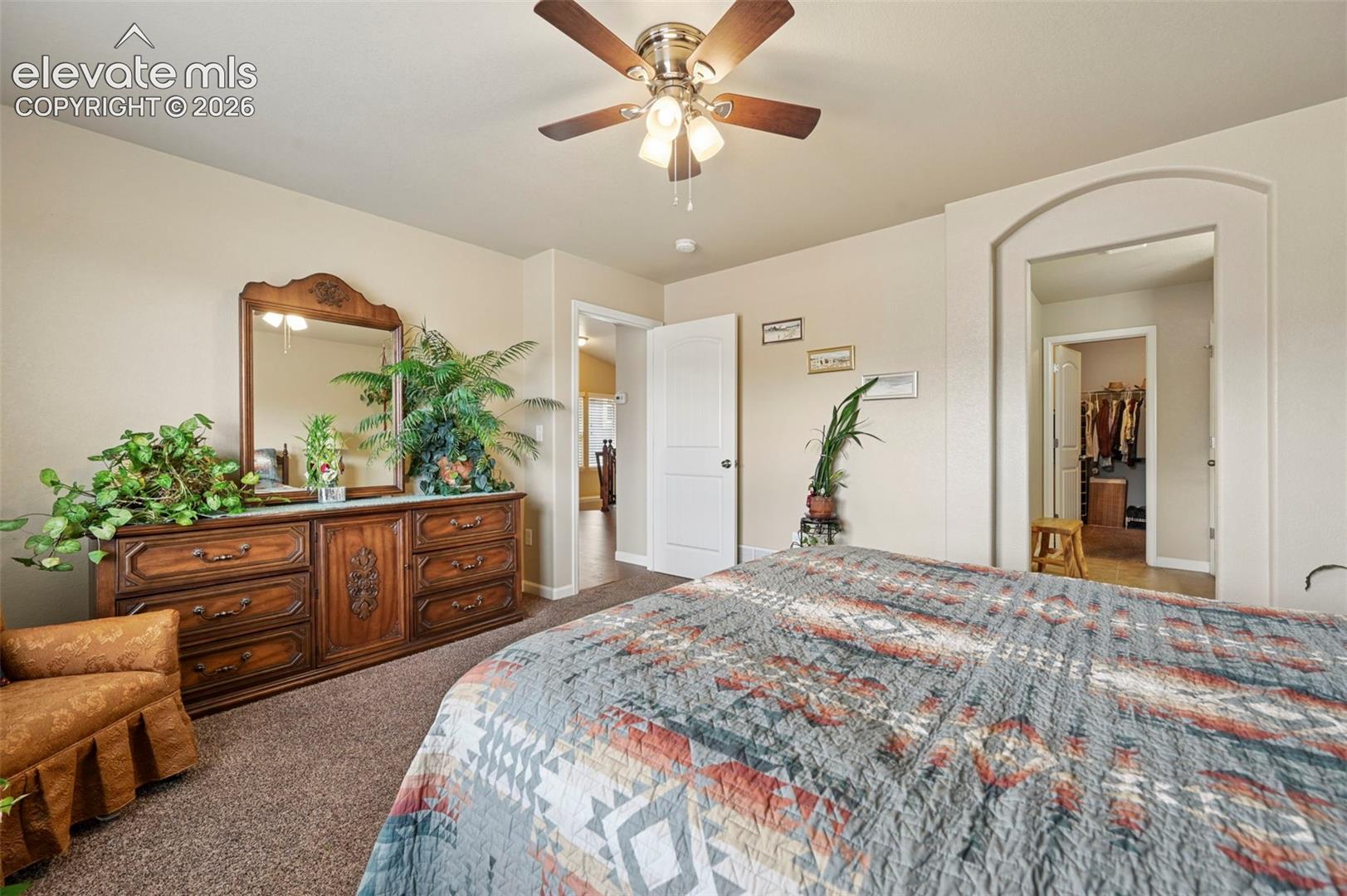 Primary suite with attached bath with walk-in closet