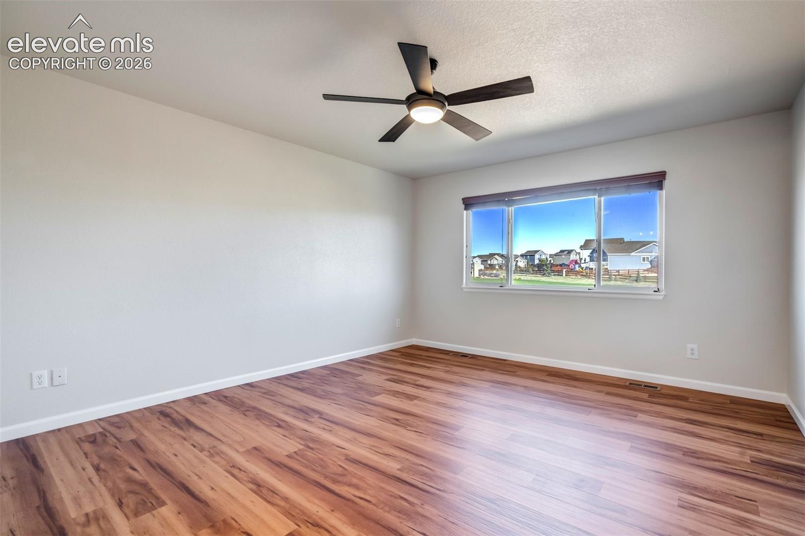 Ceiling fan & no carpet. 