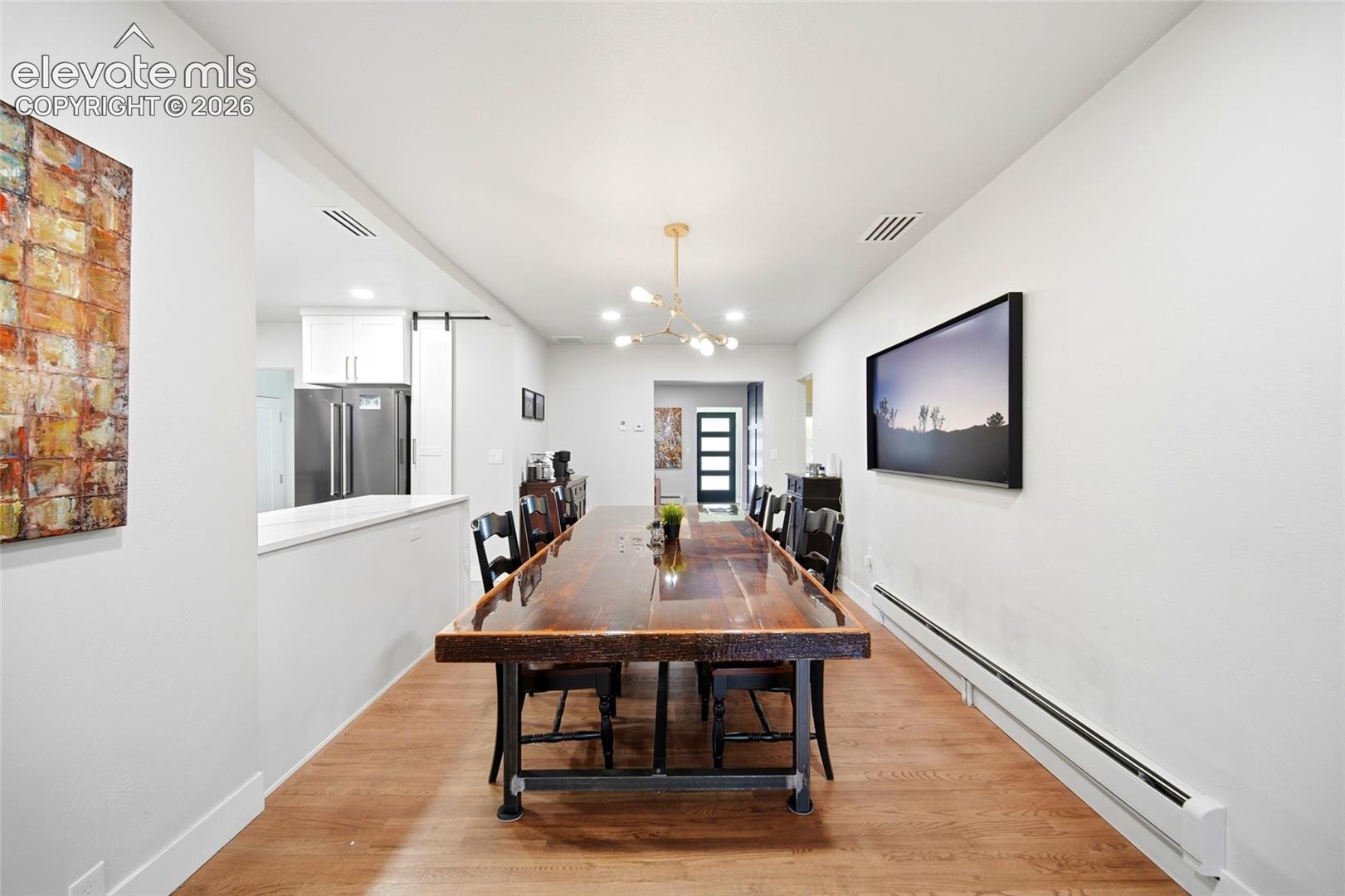 Good food, good drinks, and good company are always the star of the show in this home. The centrally located dining room means the heart of the party is always just a few steps away. 