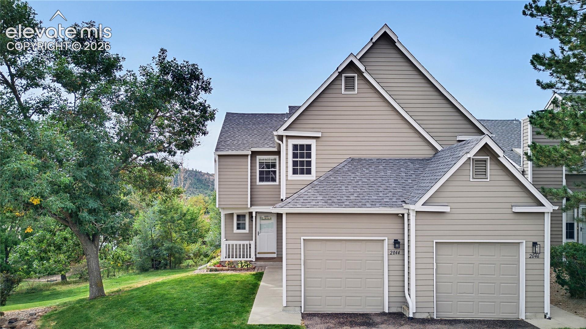 Welcome to this beautiful end-unit town home located in the heart of Union Bluffs.  The first thing you will see is the privacy provided by this unit, surrounded by trees and backing up to open community space.  As you enter you are greeted with sprawling hard wood floors throughout the main level.  The living room has vaulted ceilings and updated gas fireplace. Both the living room and dining room offer newer vinyl sliding glass doors with built in blinds and walk out to a 10X12 wood deck overlooking open the space. The kitchen is truly a work of art featuring high end LG stainless steel appliances, quartz countertops, tile backsplash, recessed lighting, accent under cabinet lighting, herring bone accent wall, and soft close two-tone cabinets.  Upstairs you will find all three bedrooms.  The primary suite is good sized and attached bath is updated in all the right places.  Finaly once you enter the basement you will see a large family room that walks out to a concrete patio with just the right amount of privacy.  Lots of updates throughout the home such as plush carpet, lighting, newer paint, etc.  Set your showing today!