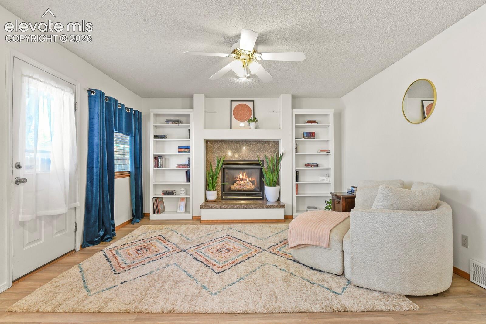 Family Room off kitchen with gas fireplace.