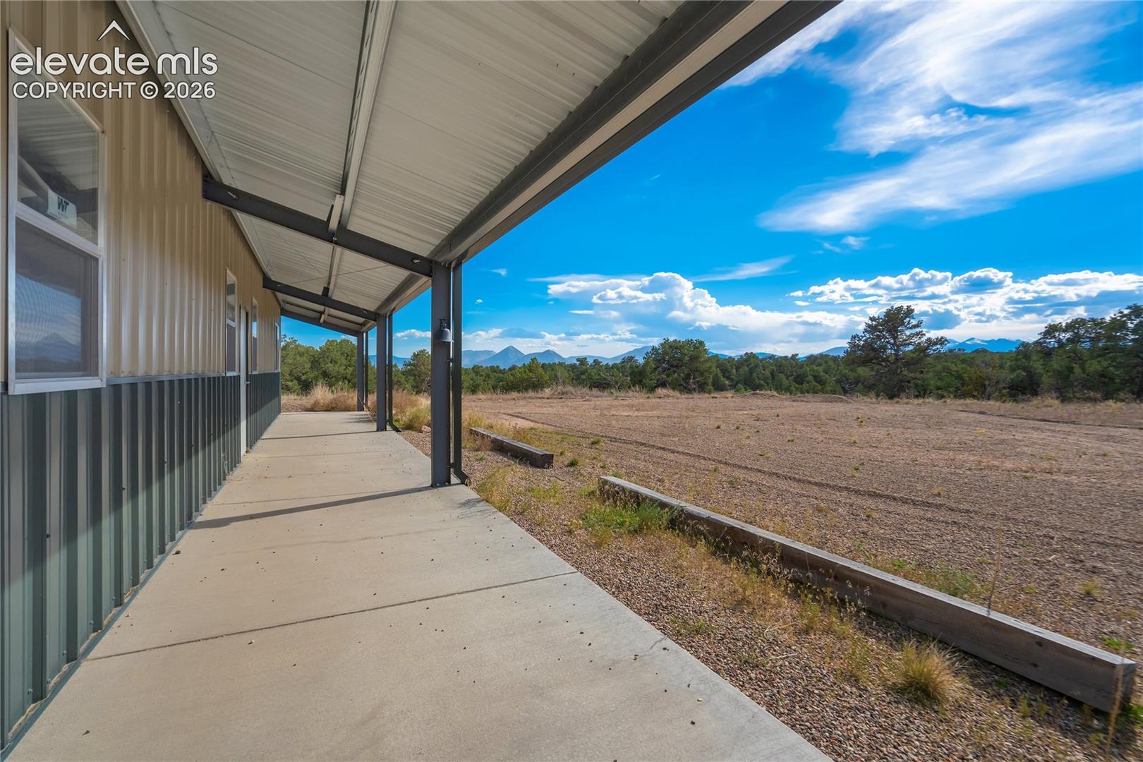 Plenty of level space for entertaining, etc right off the outbuilding