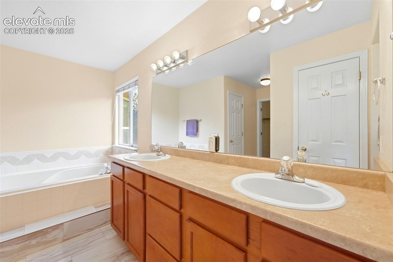 Primary Bathroom featuring Spacious Dual Vanities