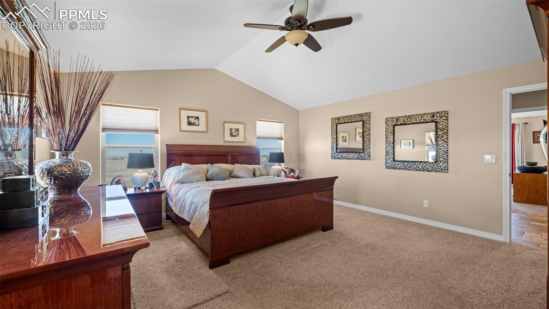 Primary bedroom, vaulted ceiling, adjoining 5 piece bath