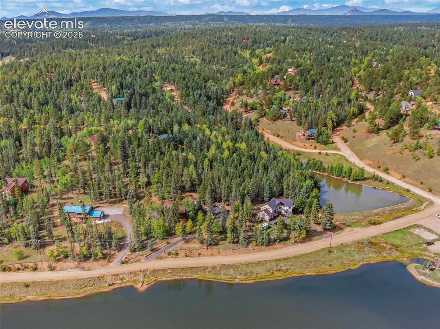 Ariel view of property and lake.