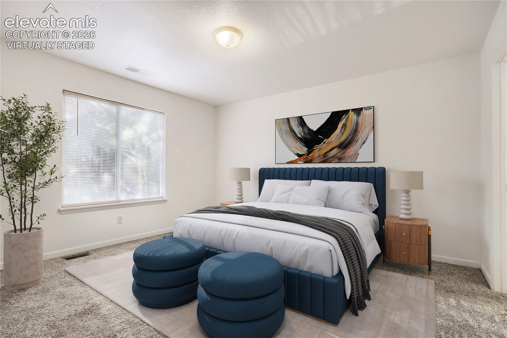 Neutral-toned interior space featuring neutral wall-to-wall carpeting and a large window with natural light exposure, finished with a central ceiling-mounted light fixture virtually staged