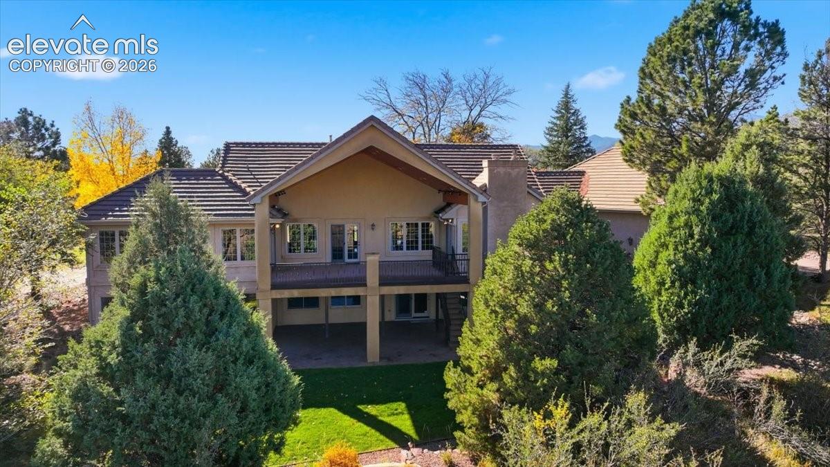 Two levels of covered deck/patio space offers the perfect way to enjoy the outdoors. 