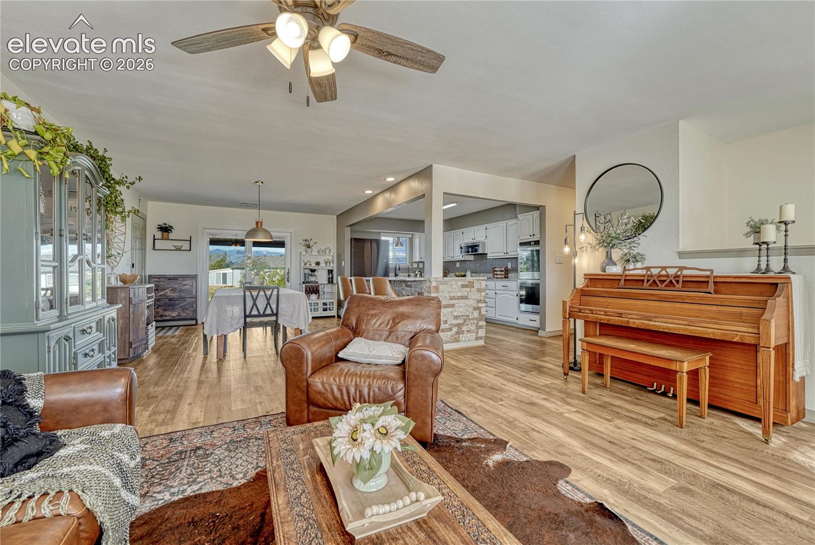 Open from the living room to the dining area and kitchen