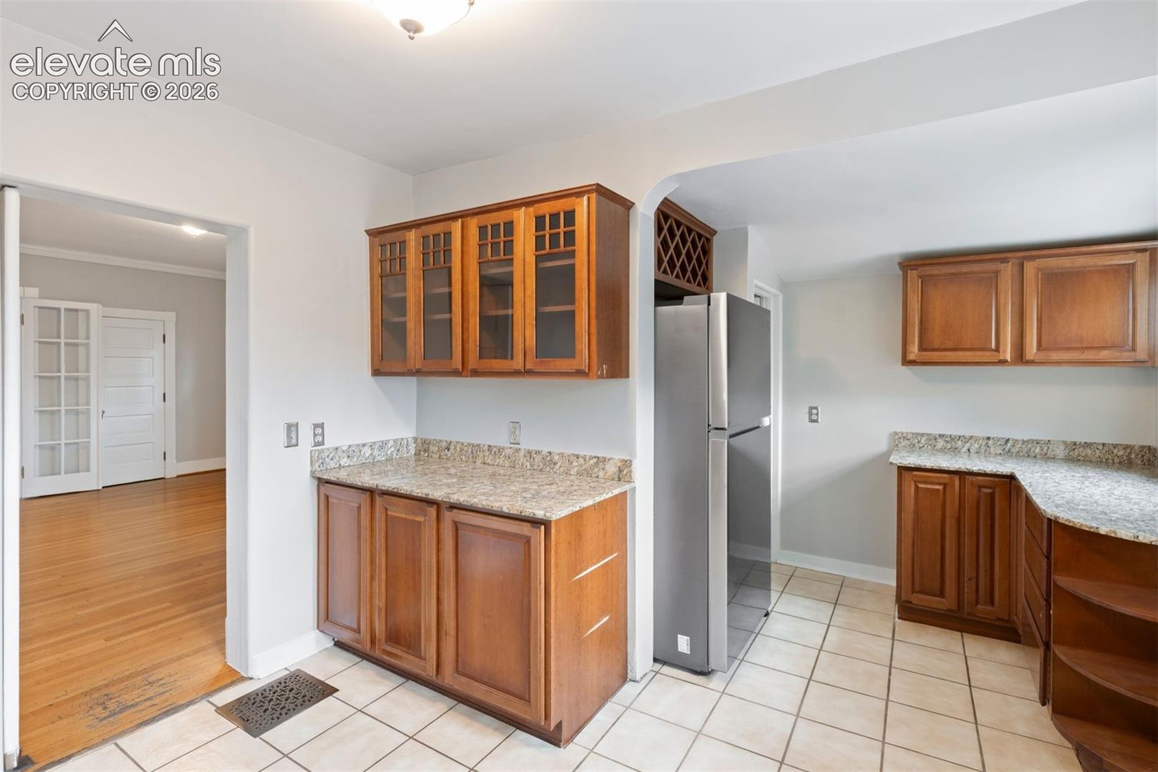 Update kitchen, walk out access, granite counters