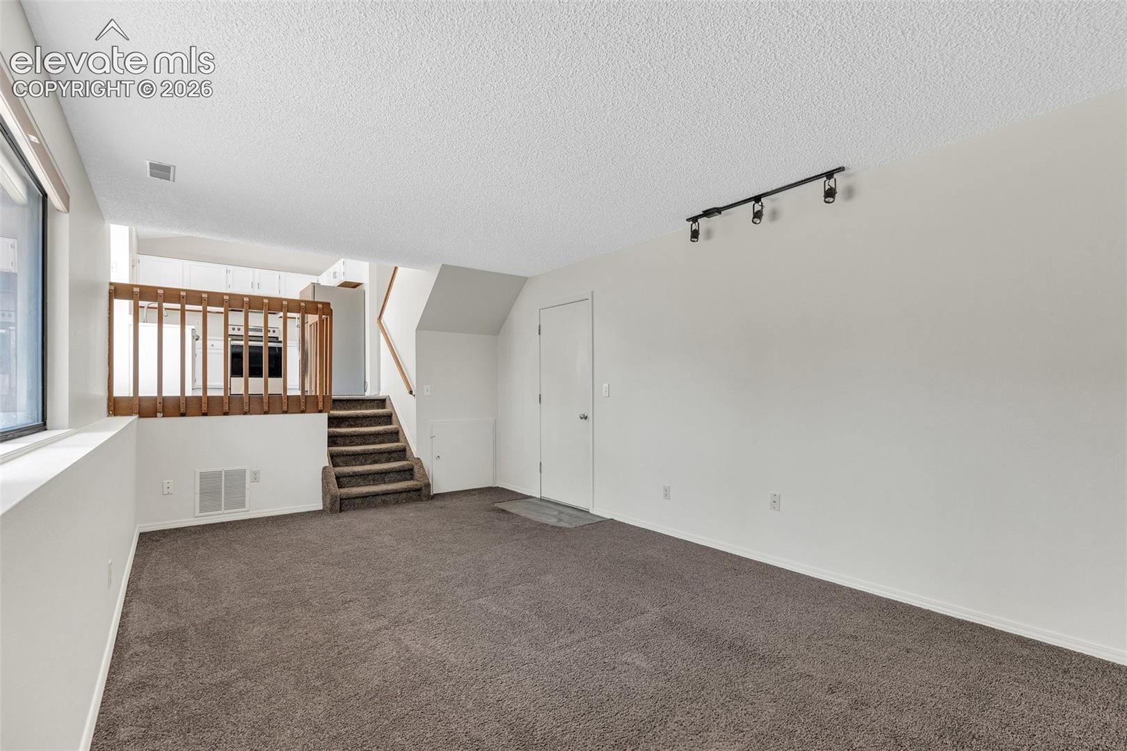 Spacious family room  and track lighting