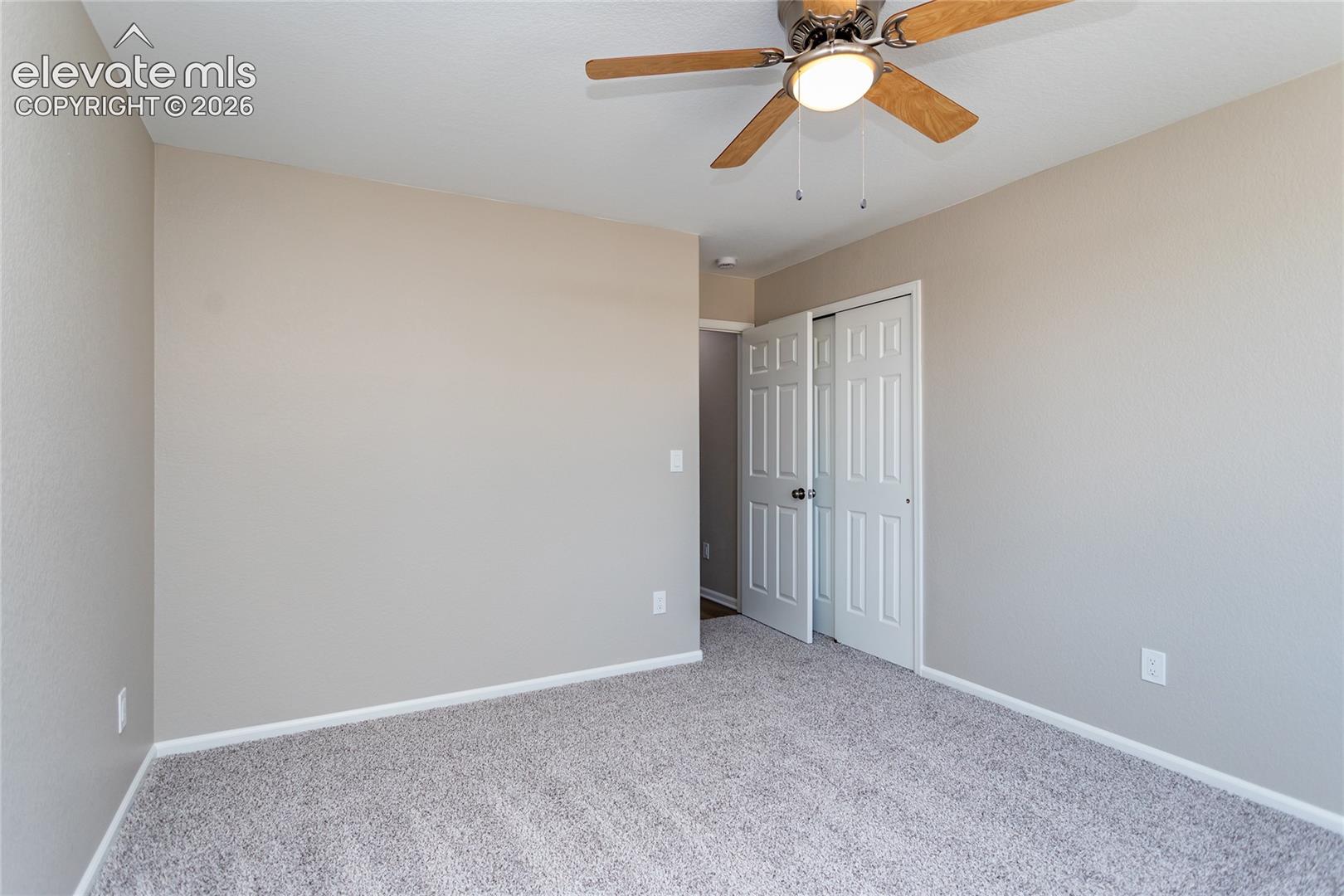 This secondary bedroom is comfy & cozy!
